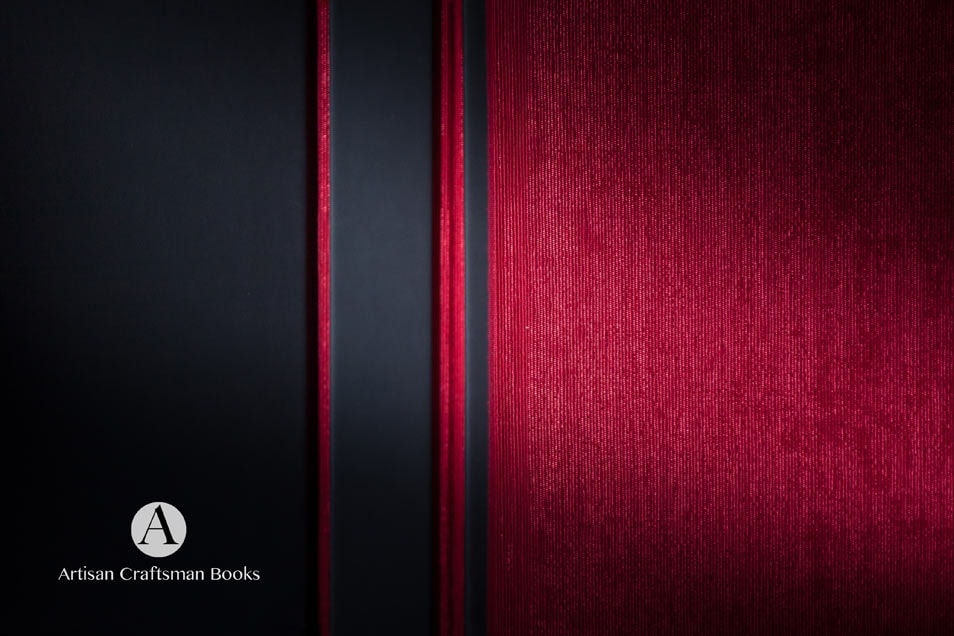 Fine art photography book with dark and burgundy covers